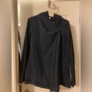 Vintage Lululemon blue wrap sweatshirt with small hood and pockets (size 6).